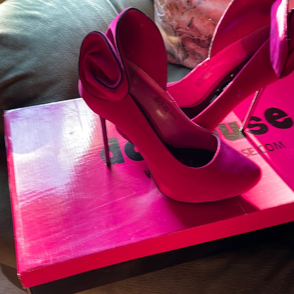 Brand new unique Fushia stilettos. Never worn